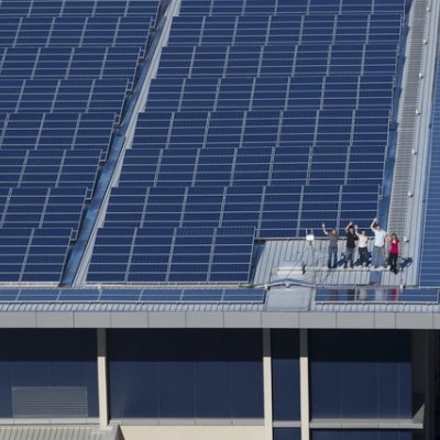 Solar panels - like these at UQ - are being installed globally at a rate of a gigawatt every week, almost as much the total amount installed during the 20th century.